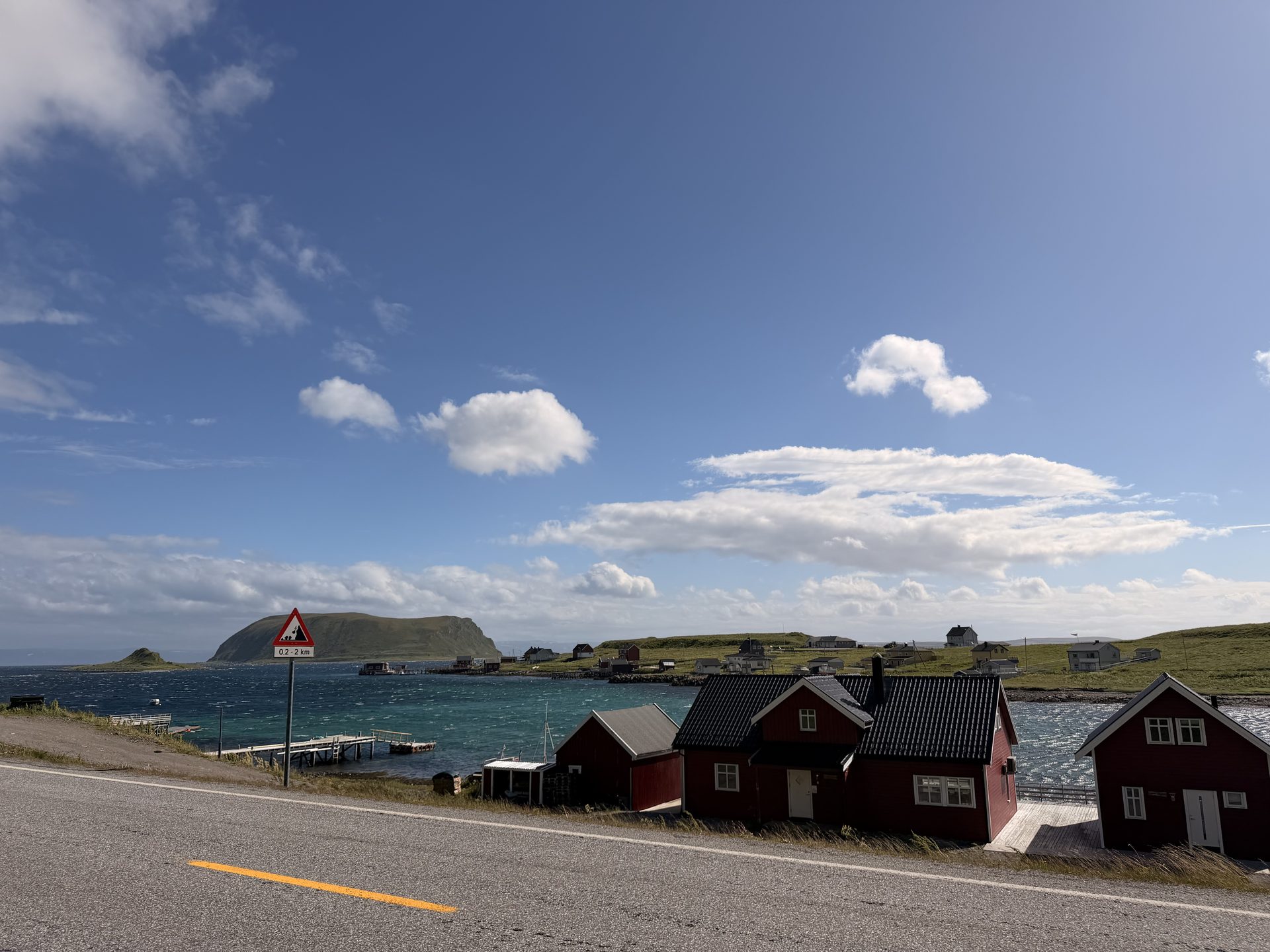Standing at the Nordkapp globe monument, North Cape, Norway